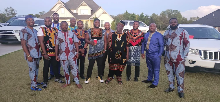 Members wearing Toghu and traditional dress